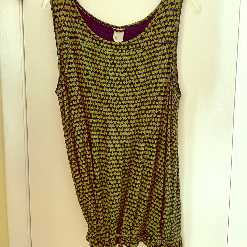 Green checkered “Skunk Funk” shirt.